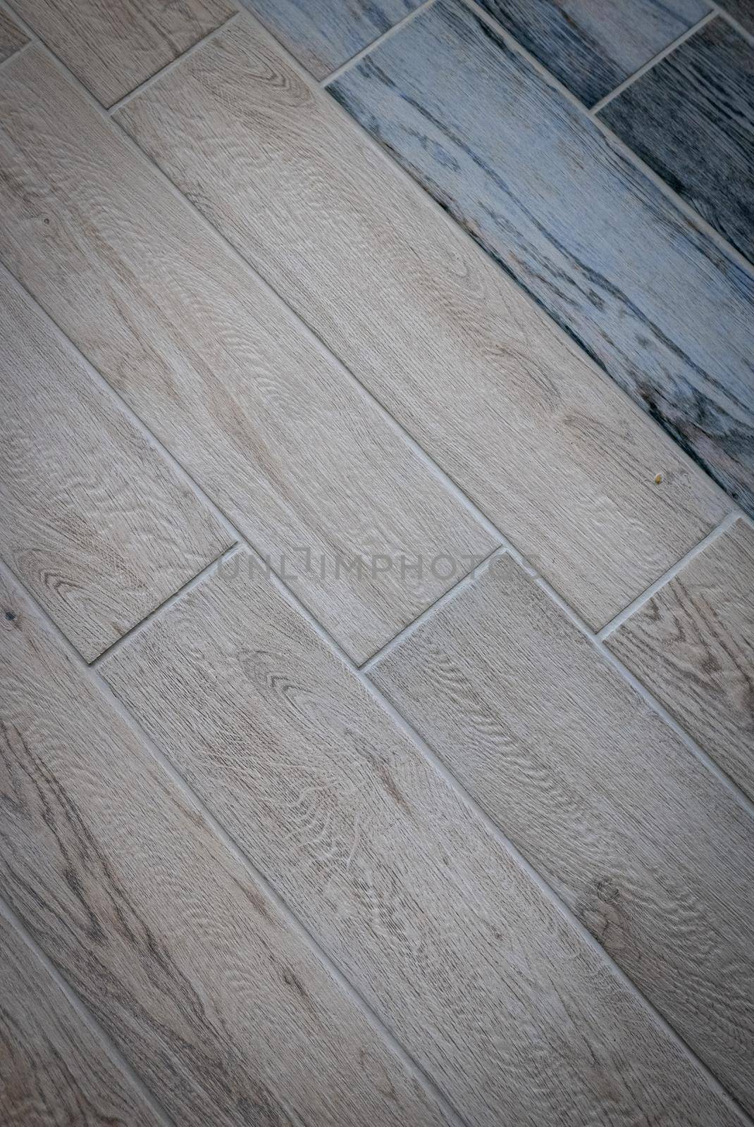 Ceramic tiles flooring - texture of natural ceramic floor decorating as wood.