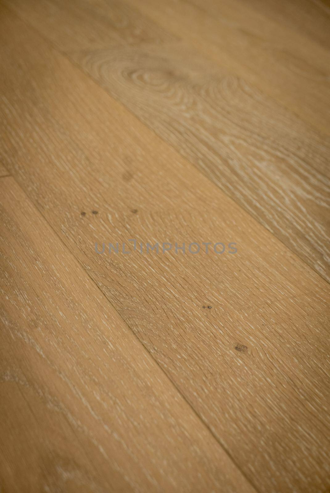 Dark brown wooden parquet floor texture as background.