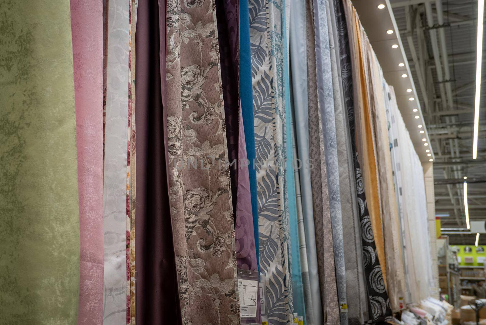 Curtains of different colors and styles in the shop by sharafizdushanbe