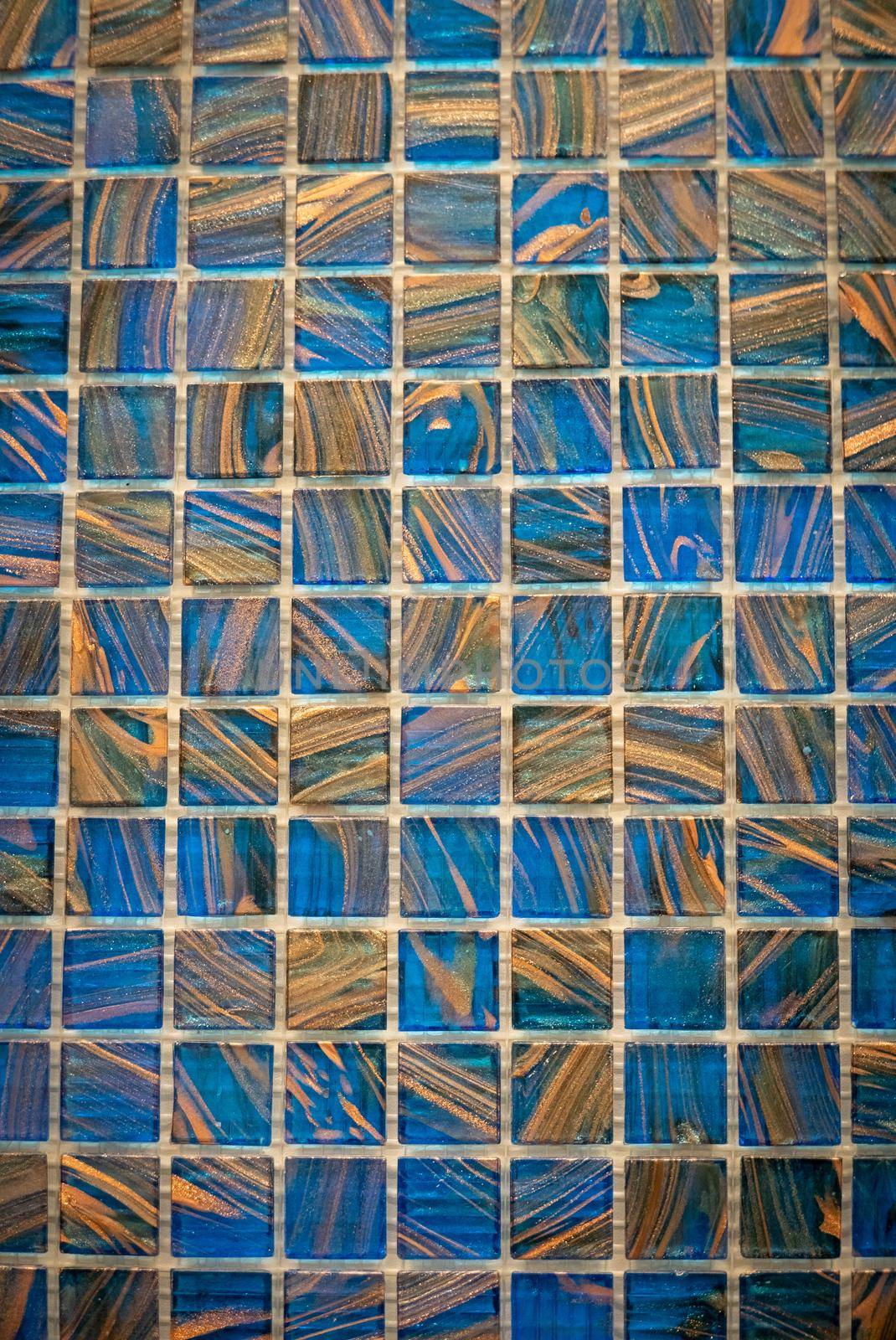 Brown and blue ceramic mosaic on the wall as background by sharafizdushanbe