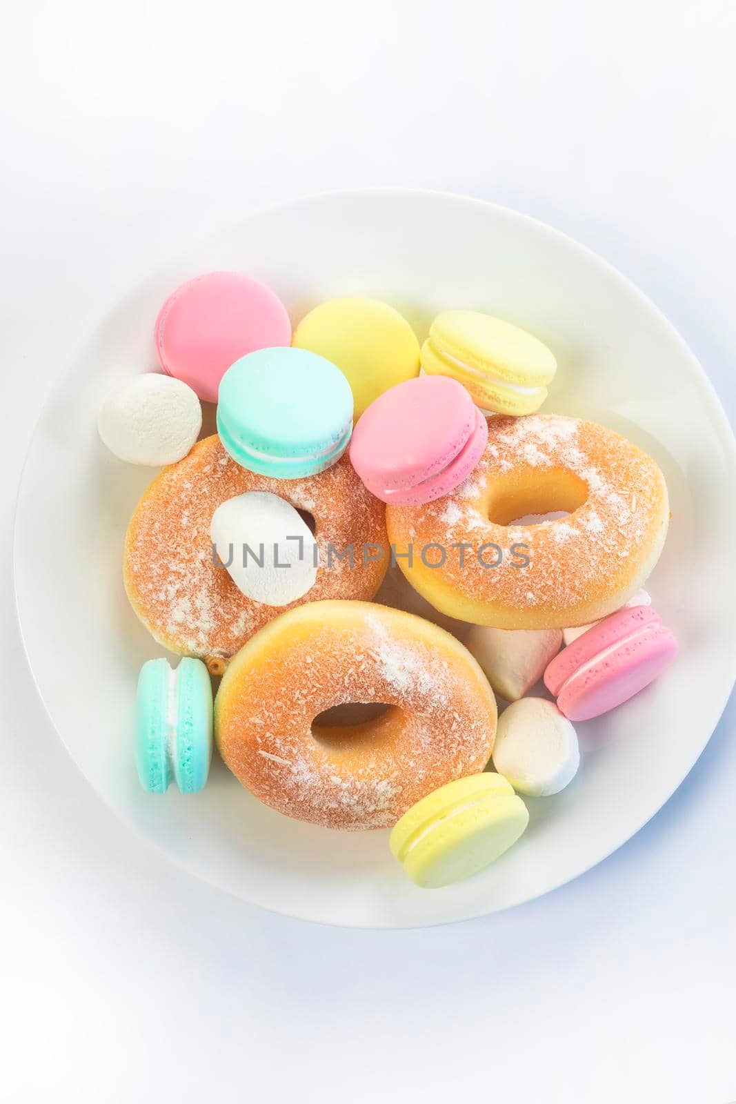 Different sweets isolated on white background, Doughnuts, macarons top view, unhealthy and candy concept by Annebel146