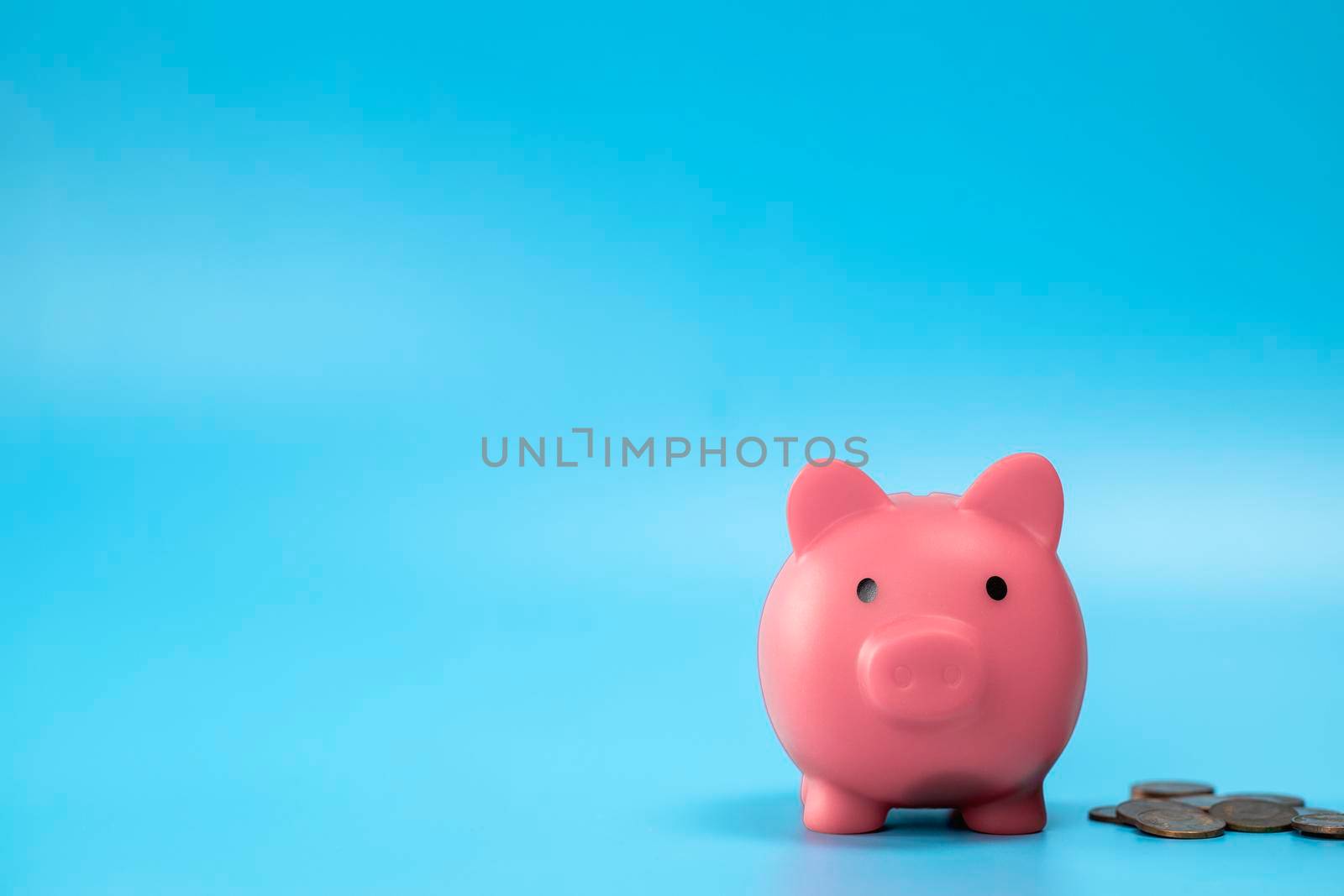 Pink Piggy Bank with stack of coins, growth and saving concept, Business and financial with copy space. space for text