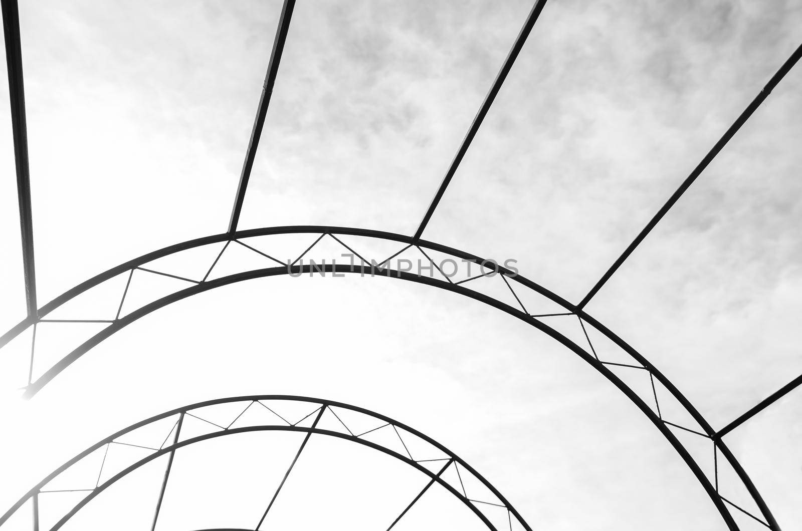 Arc metal structure on a sky background abstraction . Architecture, decorative elements. Constructive trusses. by iLixe48