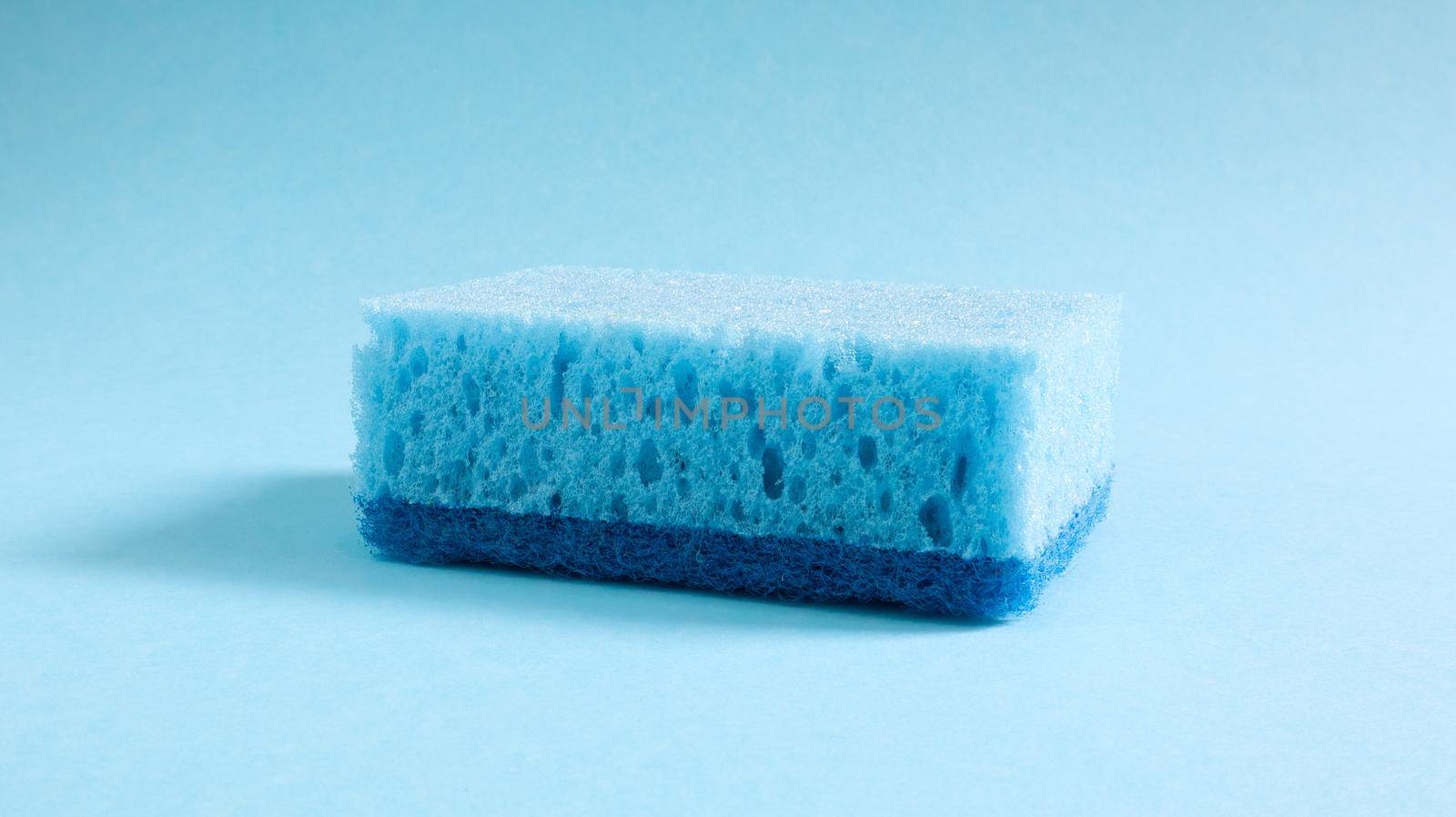One blue sponge used to wash and erase dirt used by housewives in everyday life. They are made of porous material such as foam. Detergent retention, which allows you to spend it economically.