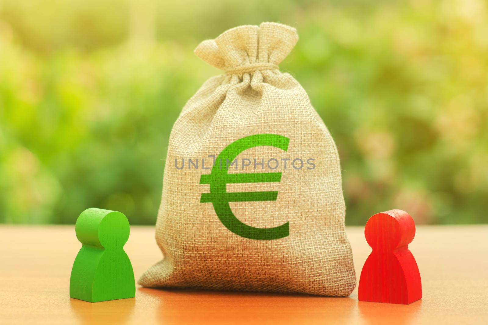Money bag with Euro symbol and two people figures. Business Investment and lending, leasing. Business relationship. Dispute and its solution between two businessmen. division of property and divorce. by iLixe48