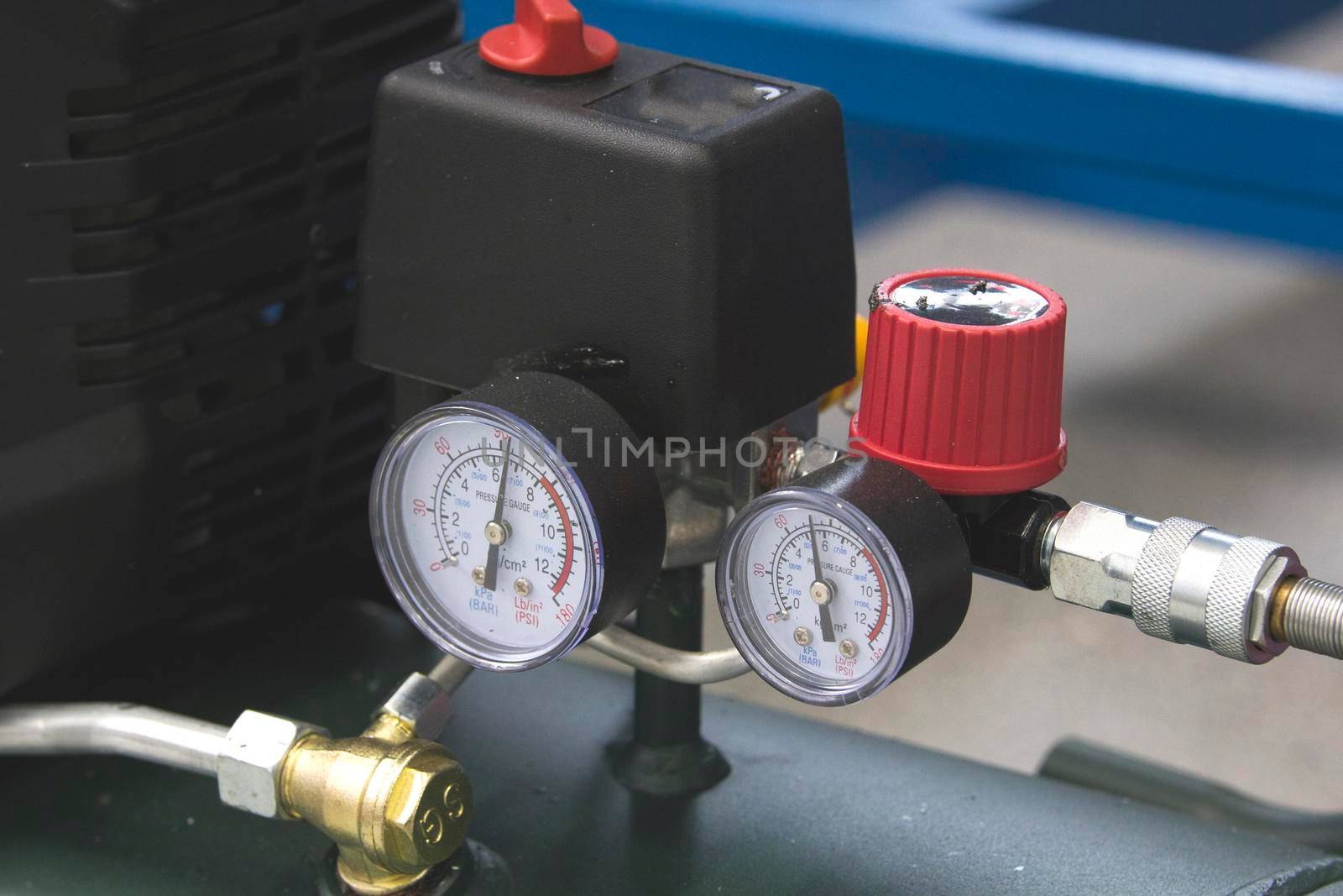 Two manometers on industrial device in factory, close up