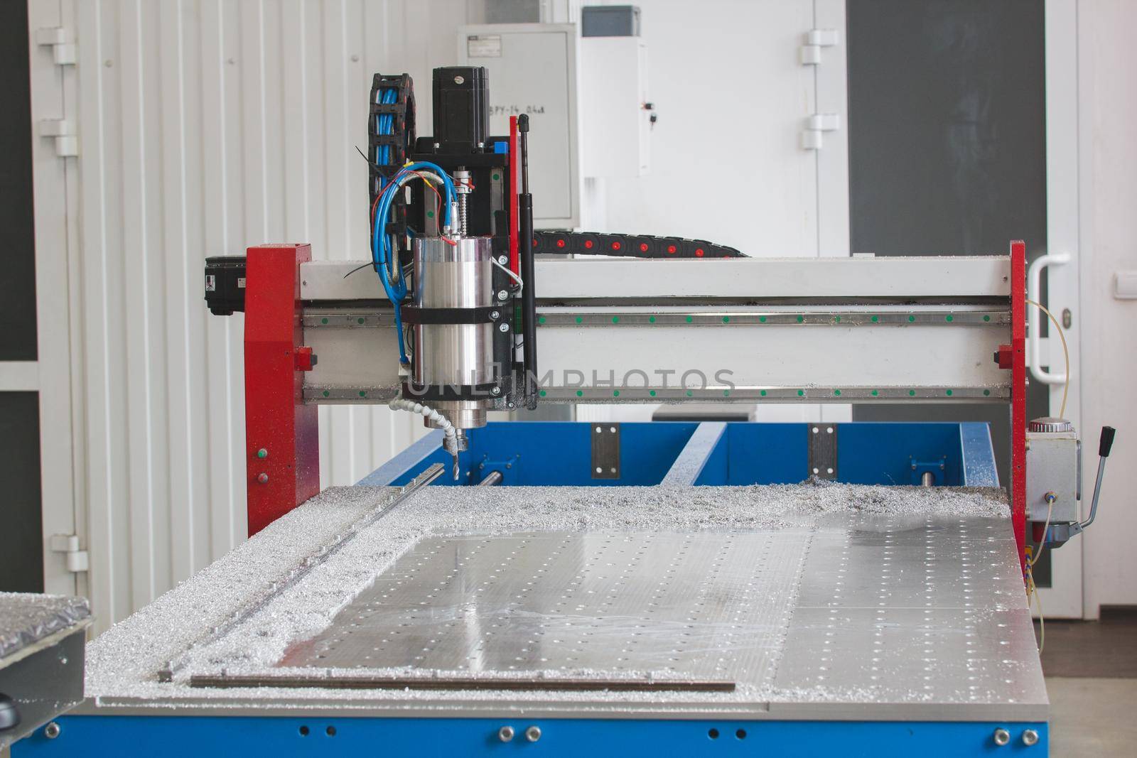 Industrial metal detail on production factory of CNC machine lathes, close up