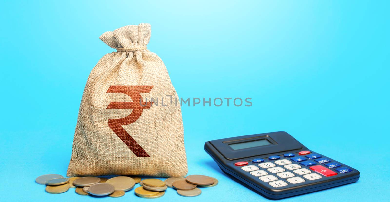 Indian rupee money bag and calculator. Accounting concept. Analysis of loan selection. Income and expenses. Calculation of damage and insurance payments. Summing up the financial results. Budgeting.