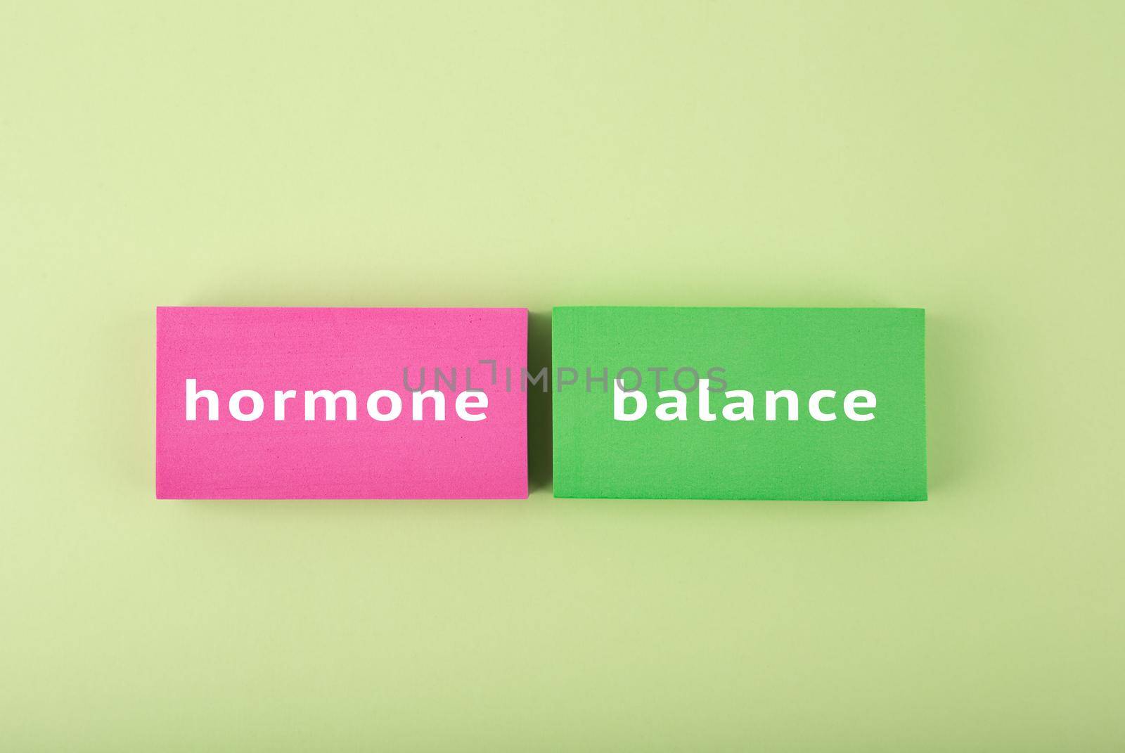 Simple hormone balance concept in bright green and pink colors by Senorina_Irina