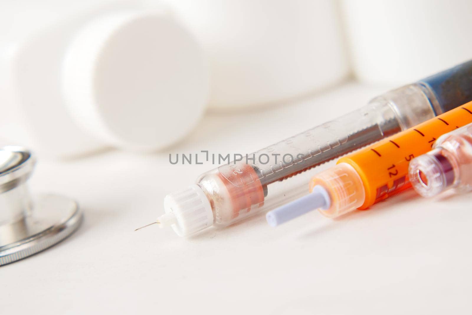 close up of Insulin pens on white background, close up .