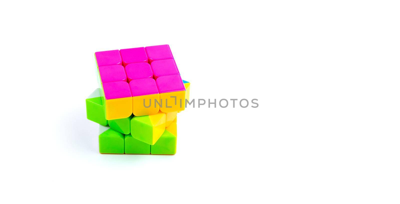 Game multi-colored cube on a white background. Game concept with copy space for text by lunarts