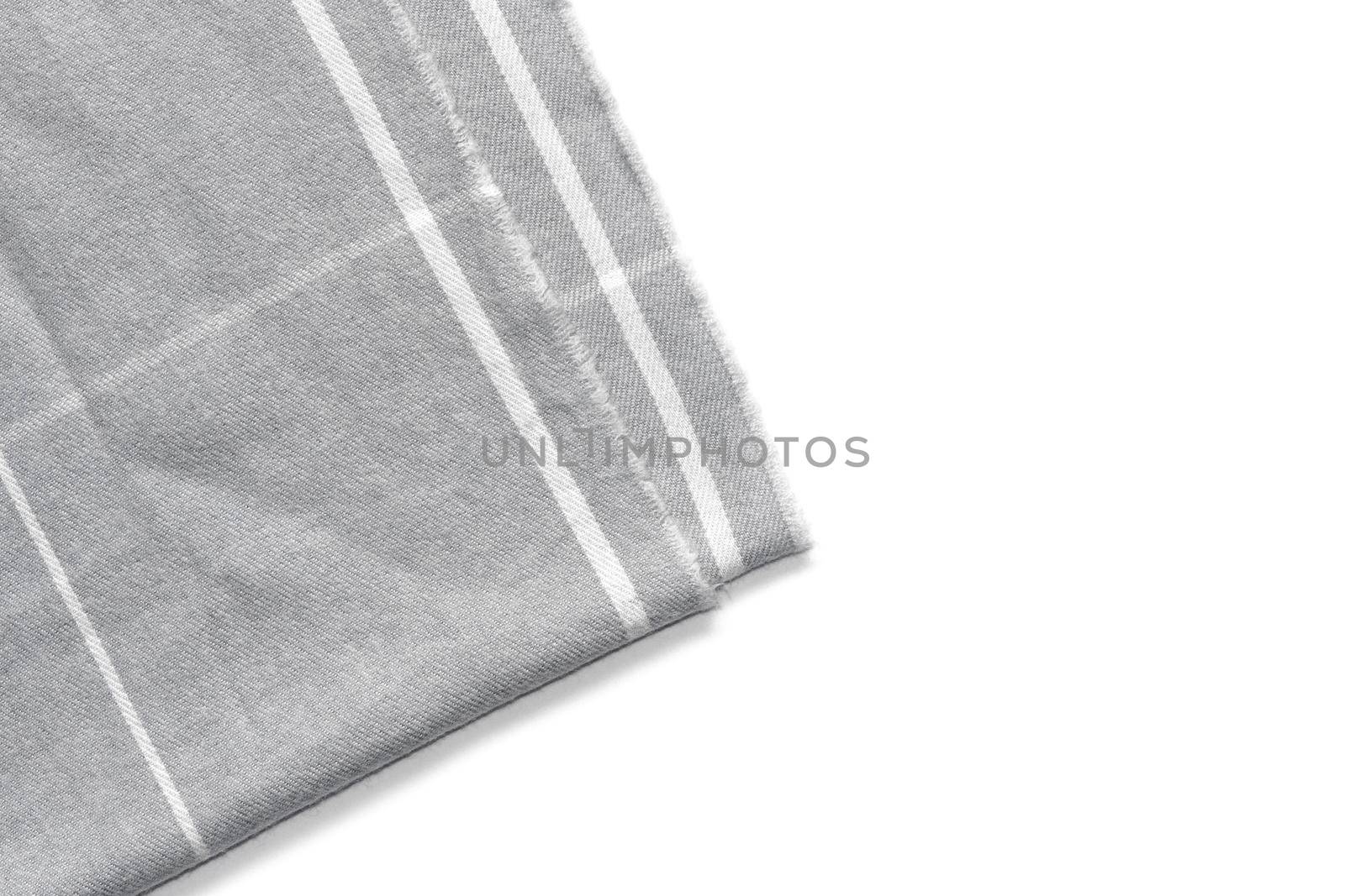 A piece of gray checked fabric is isolated on a white background with an area for text