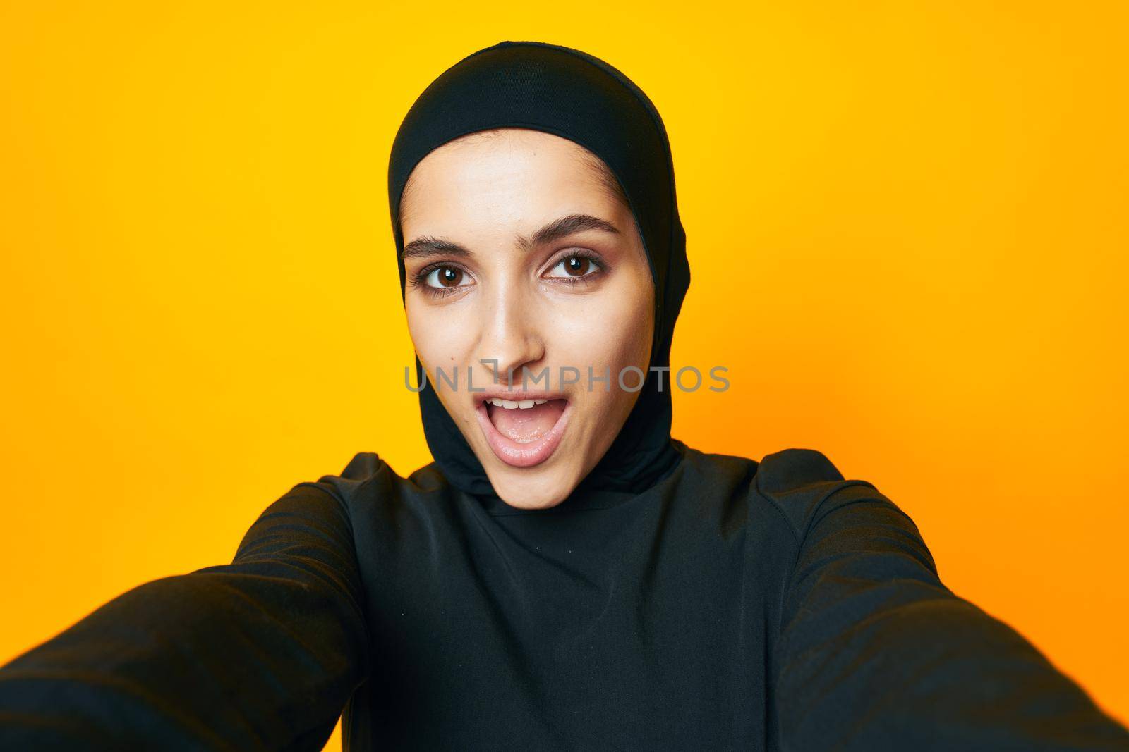 Muslim fun ethnicity model posing emotions studio lifestyle. High quality photo