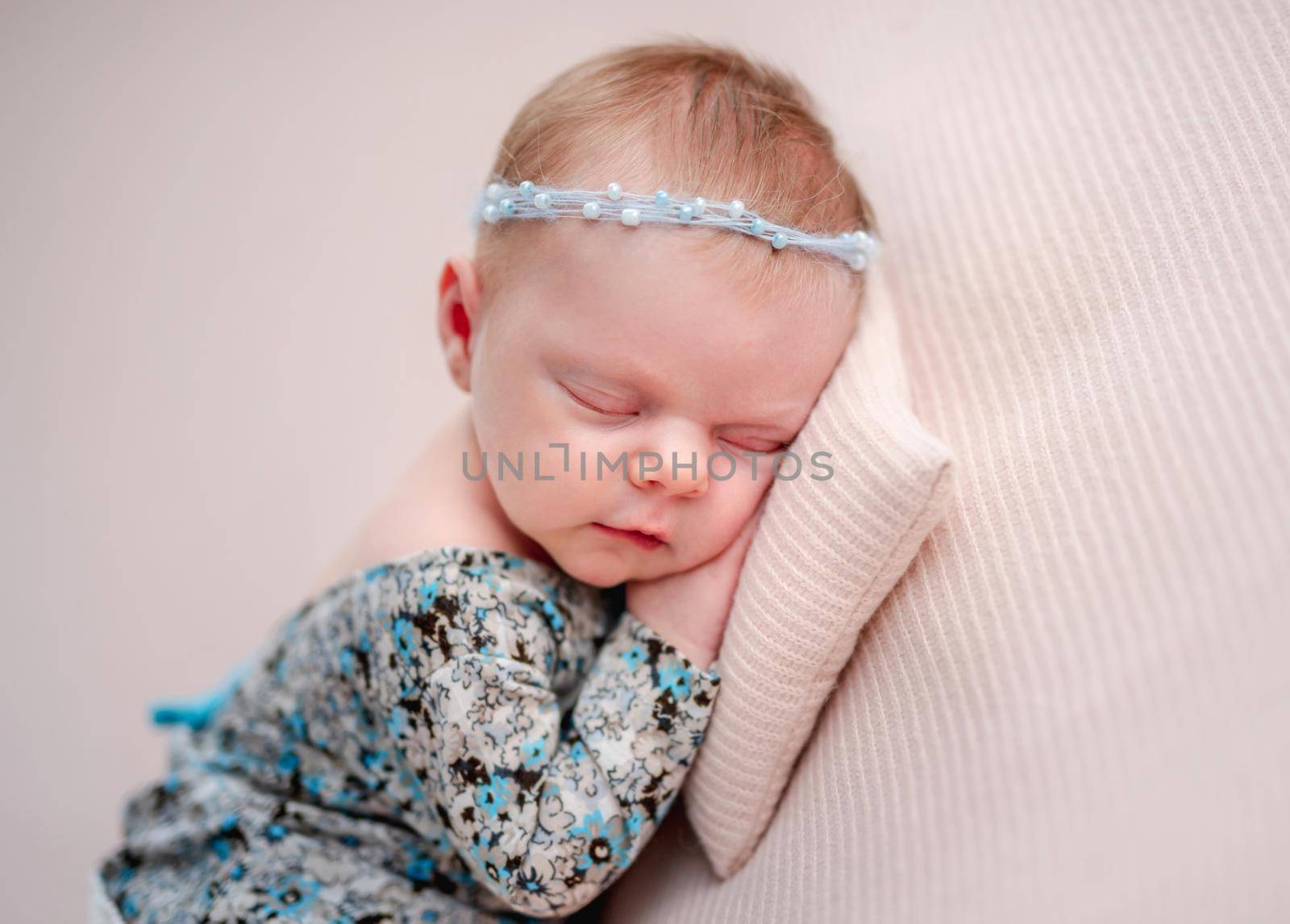 Newborn girl wearing diadem and dress by tan4ikk1