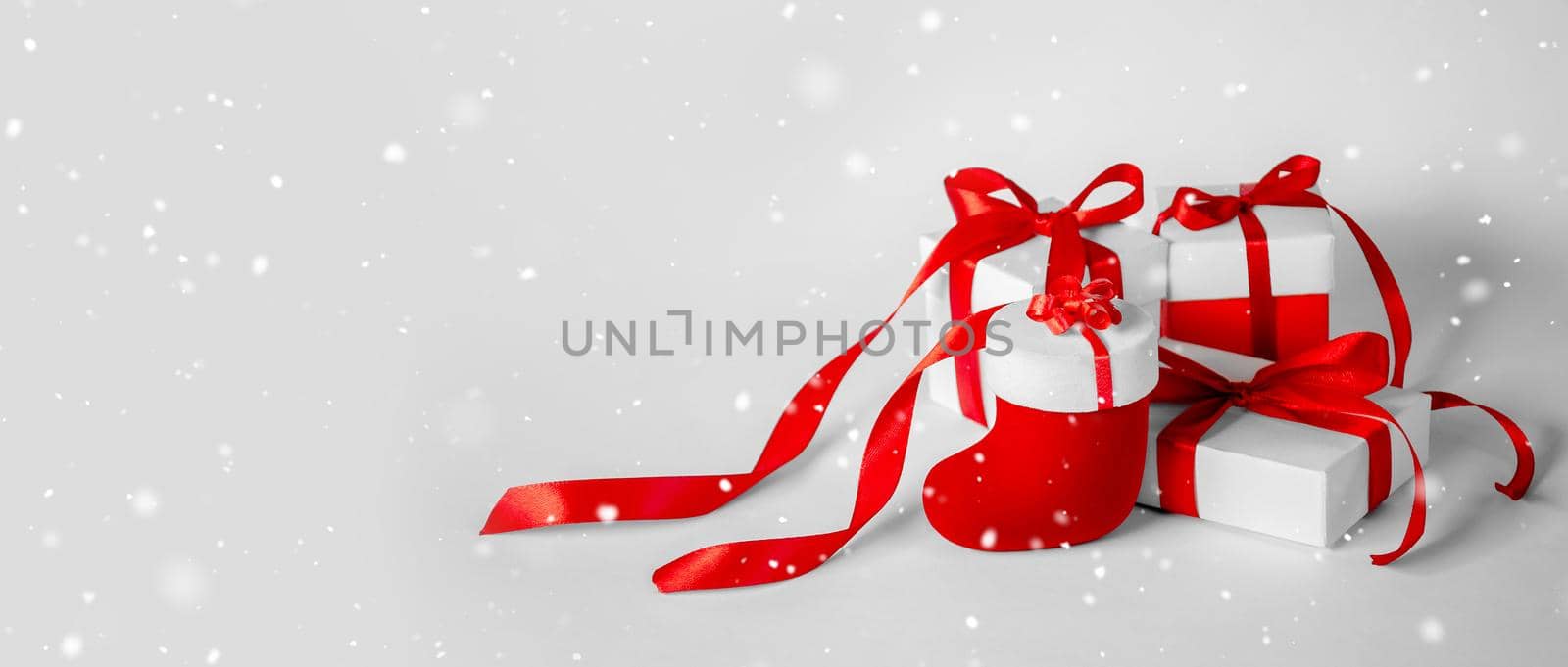 Christmas Gift's in White Box with Red Ribbon on Light Background by Svetlana_Belozerova