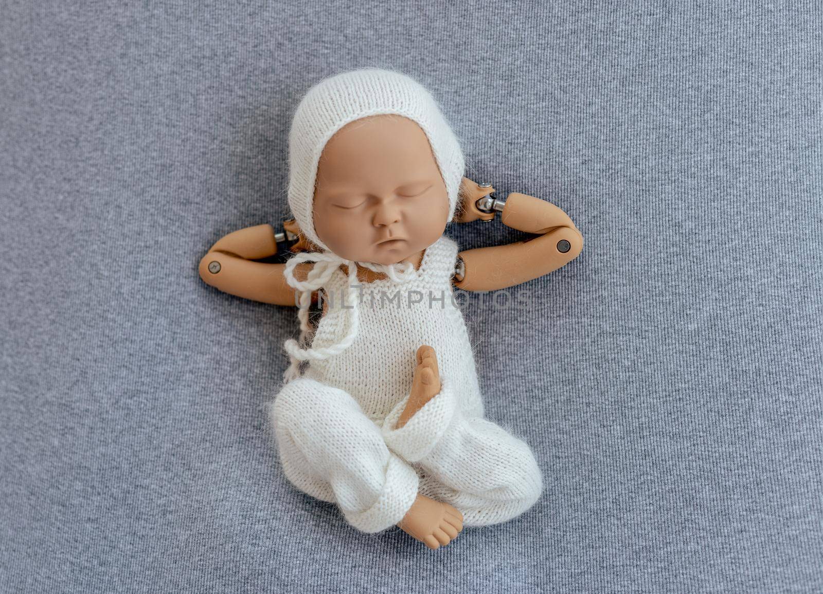 Realistic doll mannequin of newborn baby for posing training photographer practice