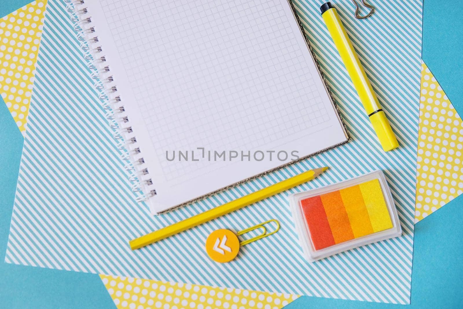 School supplies. Yellow and blue colors. Empty notebook. Flat lay composition. Space for text. by Annu1tochka