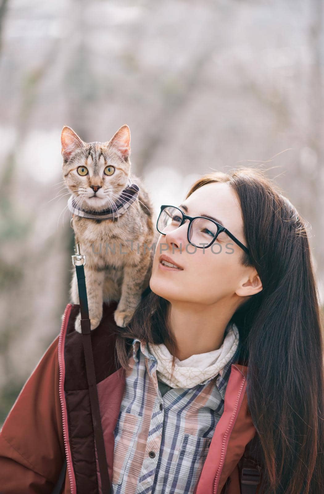 Traveler cat and woman outdoor. by alexAleksei
