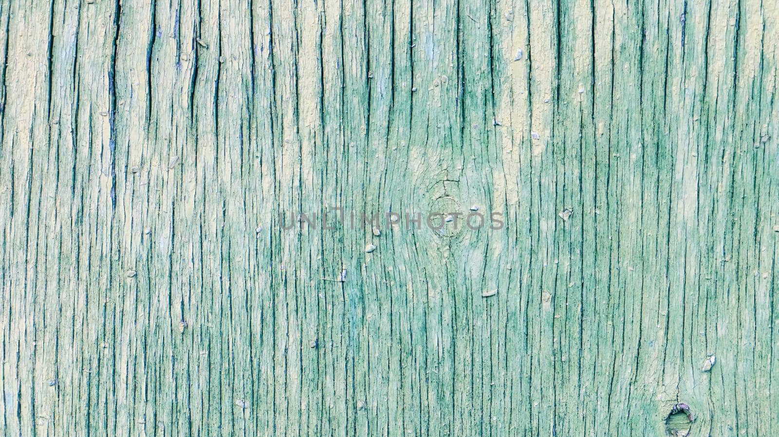 Natural texture of natural green wood. Green wooden background. The vintage panel is beautifully designed as a wall for interior and exterior design