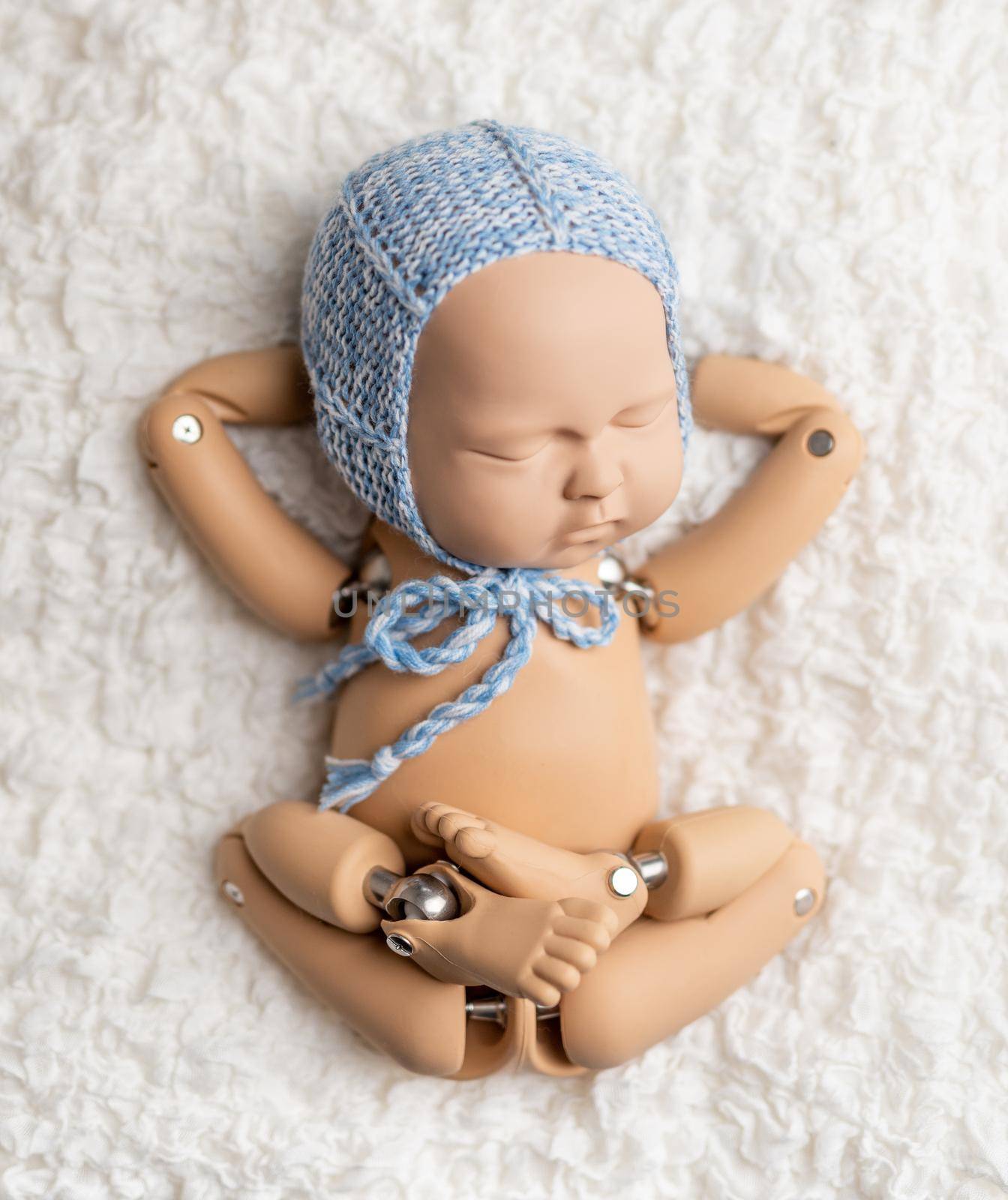 Cute toy of newborn baby for photo practice,