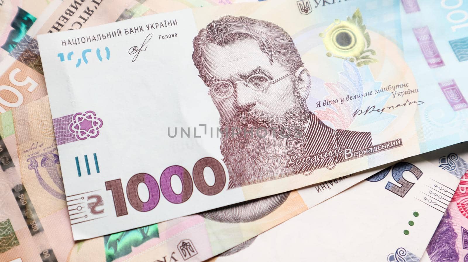 One paper note in 1000 hryvnias. Portrait of Vladimir Ivanovich Vernadsky for 1000 hryvnias on a Ukrainian banknote. Ukrainian money.