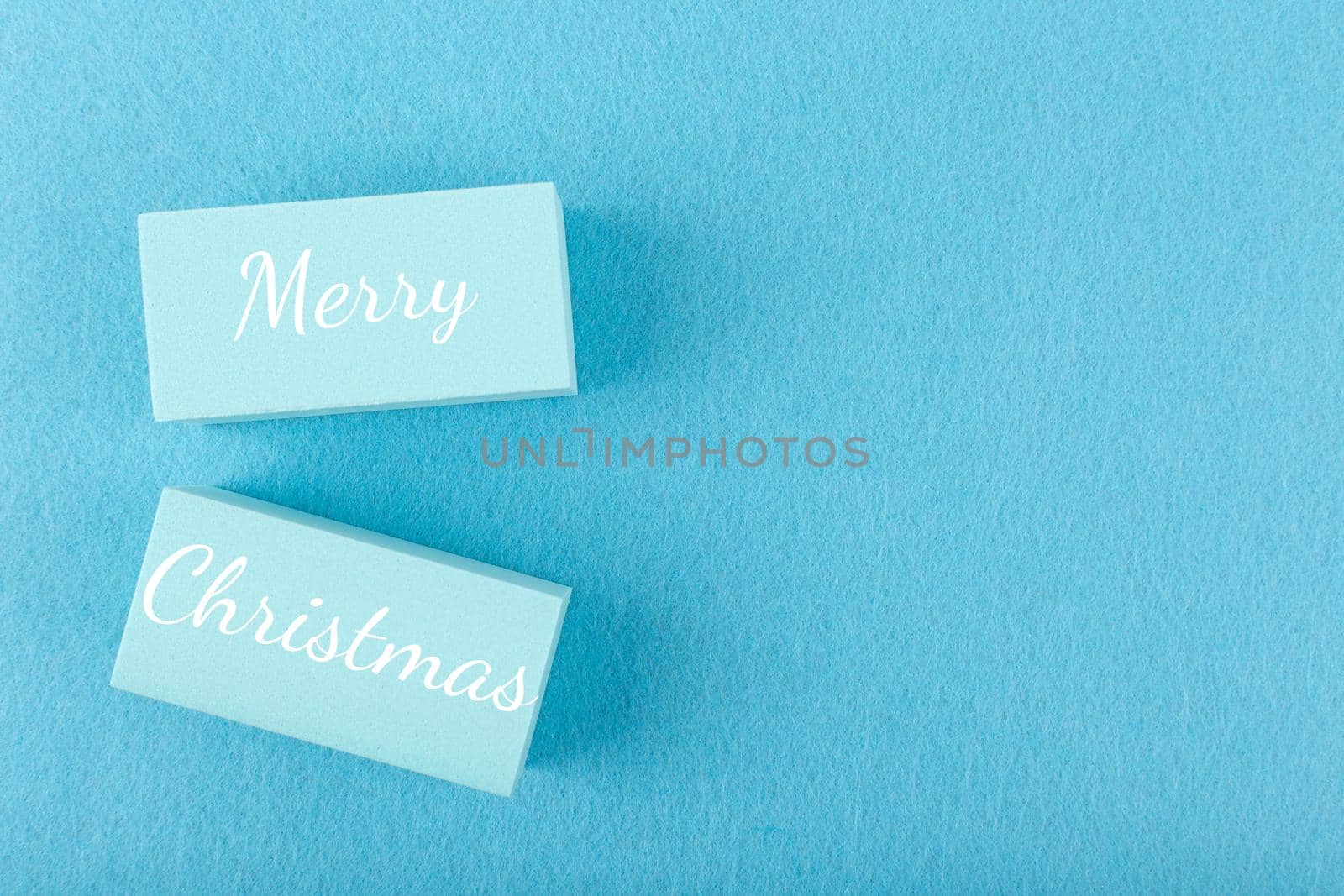 Merry Christmas minimal concept in light blue colors with copy space by Senorina_Irina