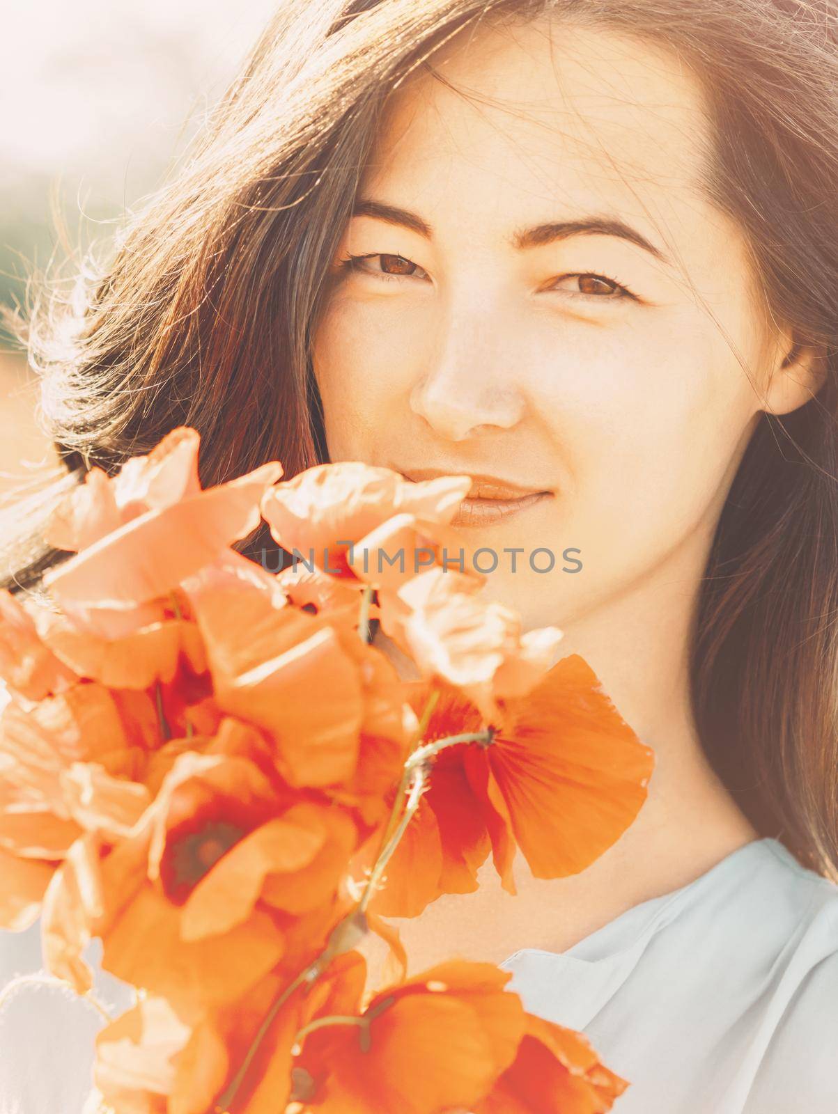 Portrait of smiling woman with poppies. by alexAleksei