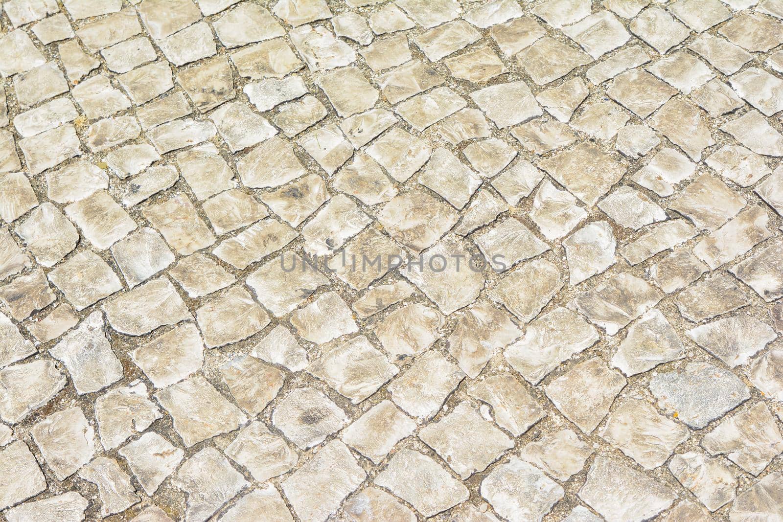 Handmade typical portuguese cobblestone Background or texture