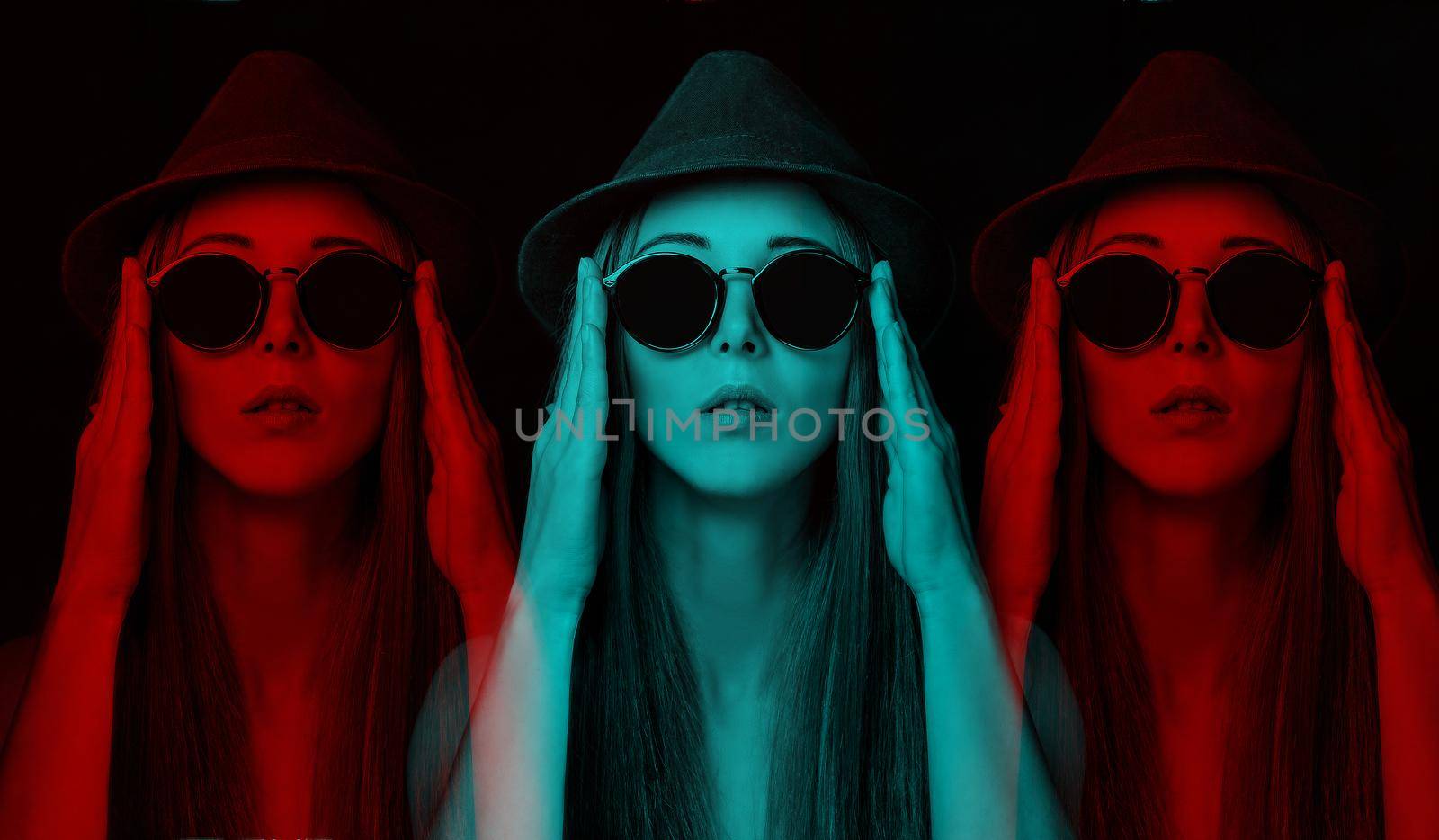 Stereo anaglyph effect of beautiful stylish young woman in glasses and hat.