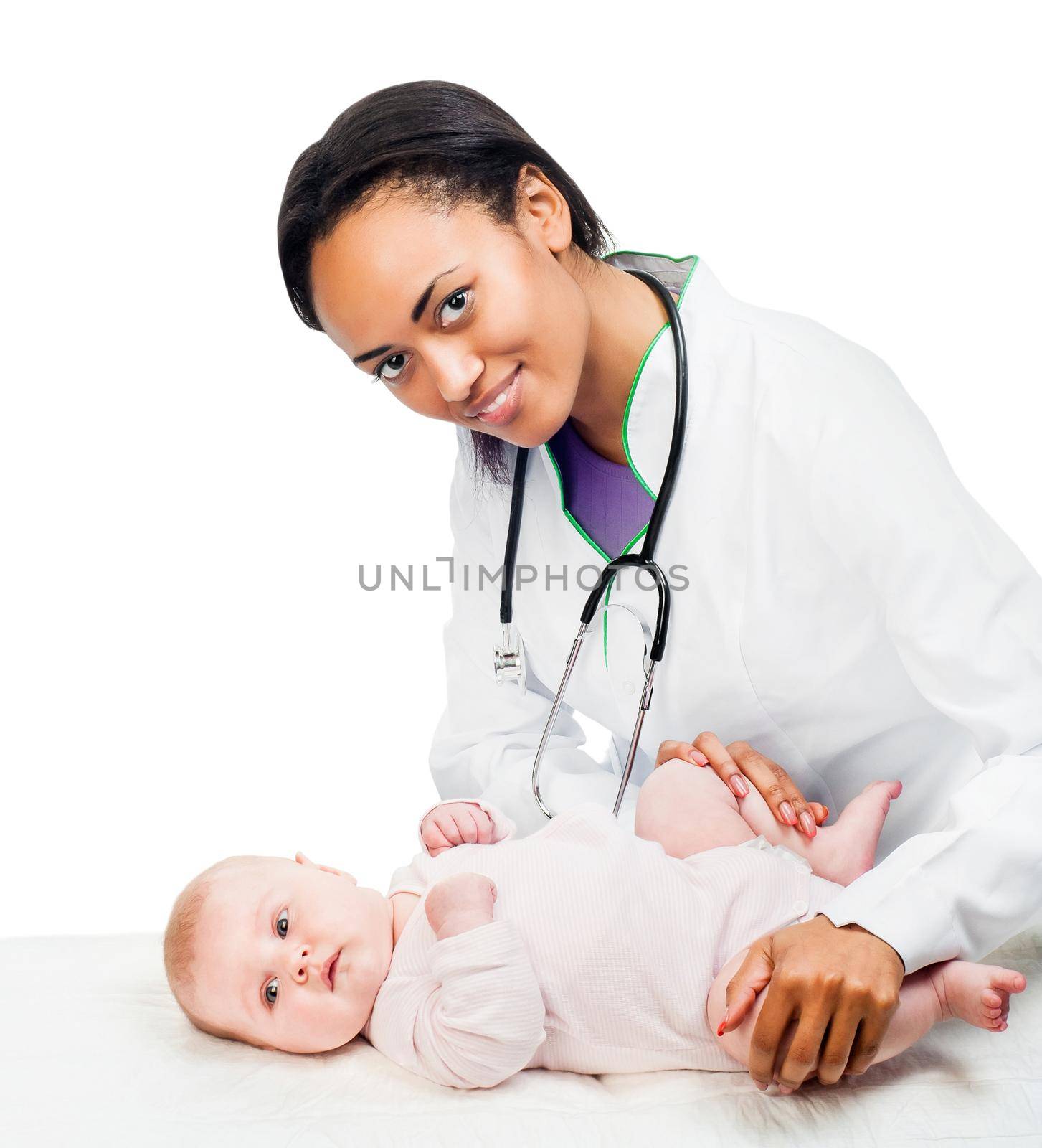 Doctor with stethoscope and small baby isolated on a white background