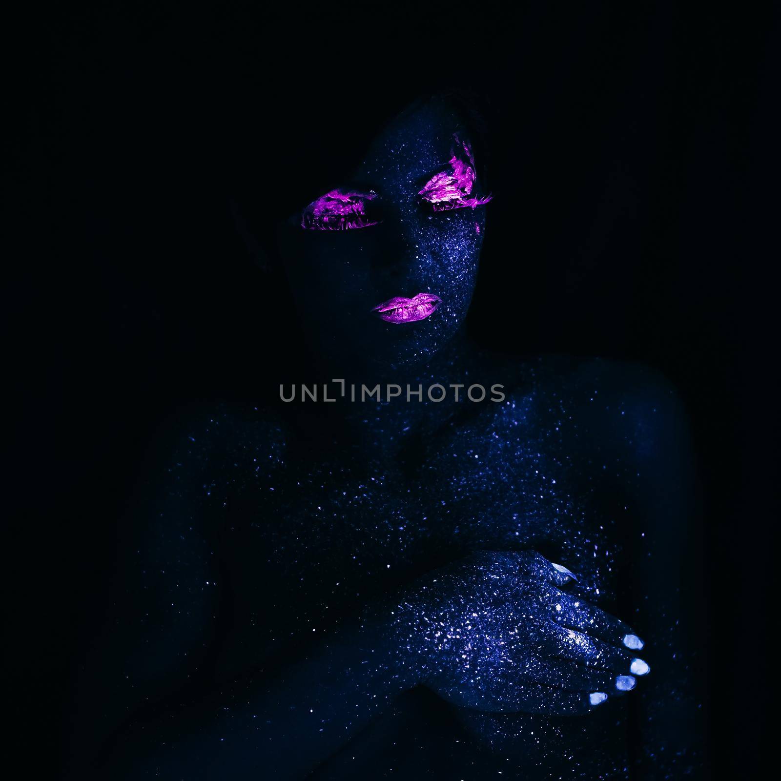 Portrait of Beautiful Fashion Woman in Neon UF Light. Model Girl with Fluorescent Creative Psychedelic MakeUp, Art Design of Female Model in UV by OnPhotoUa