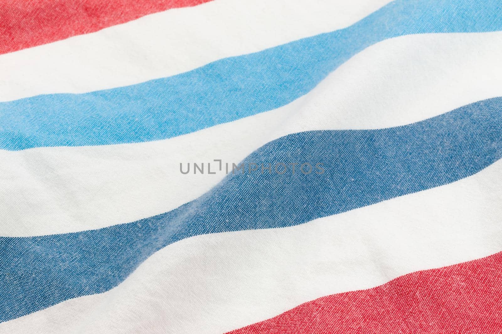 Beautiful summer background made of striped fabric of delicate colors red blue by lunarts