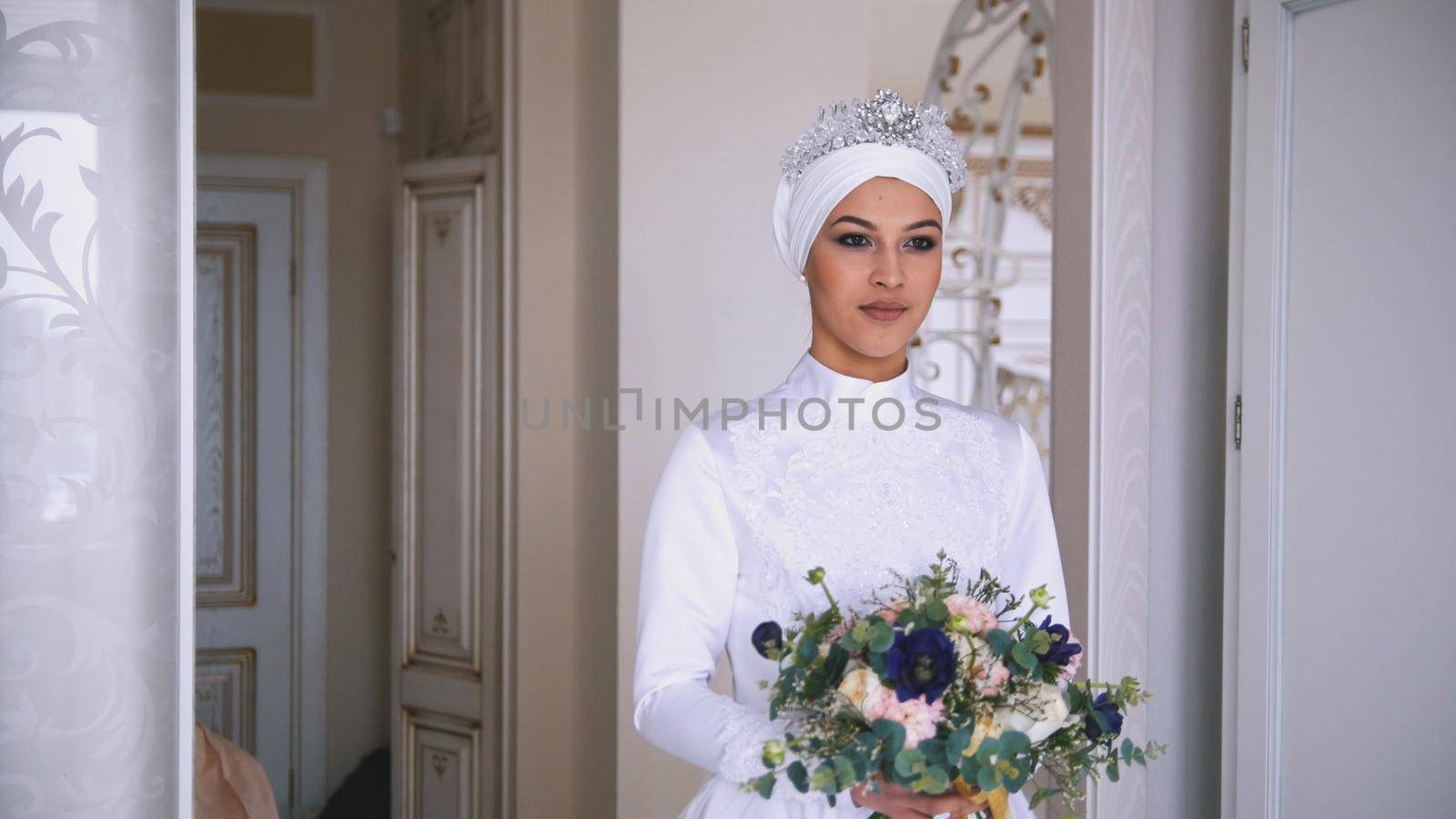 Beautiful muslim bride with make up in beautiful wedding dress by Studia72
