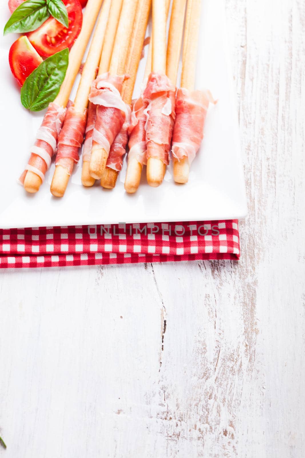 Grissini with prosciutto by oksix