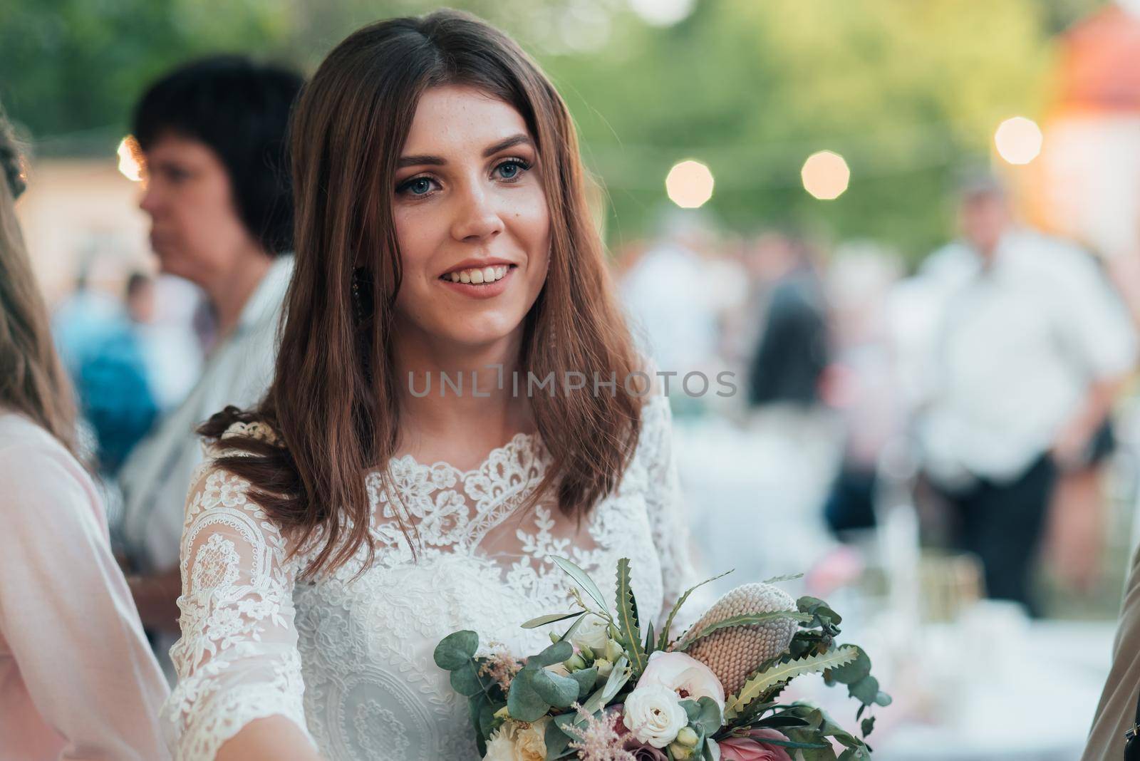 Wedding photography in rustic style emotions of the bride on the nature on the rocks