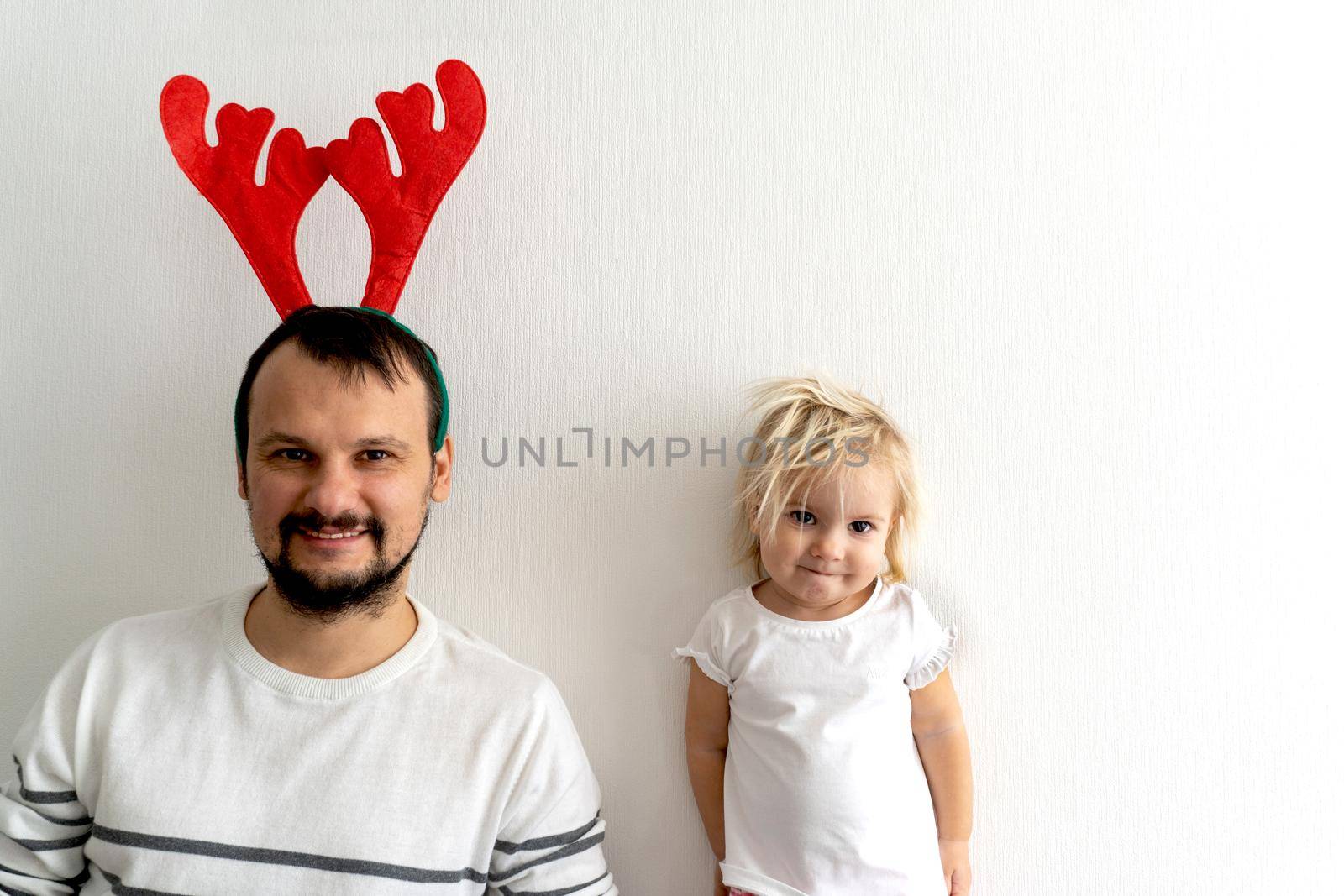 Father with baby wait for Christmas by uveita
