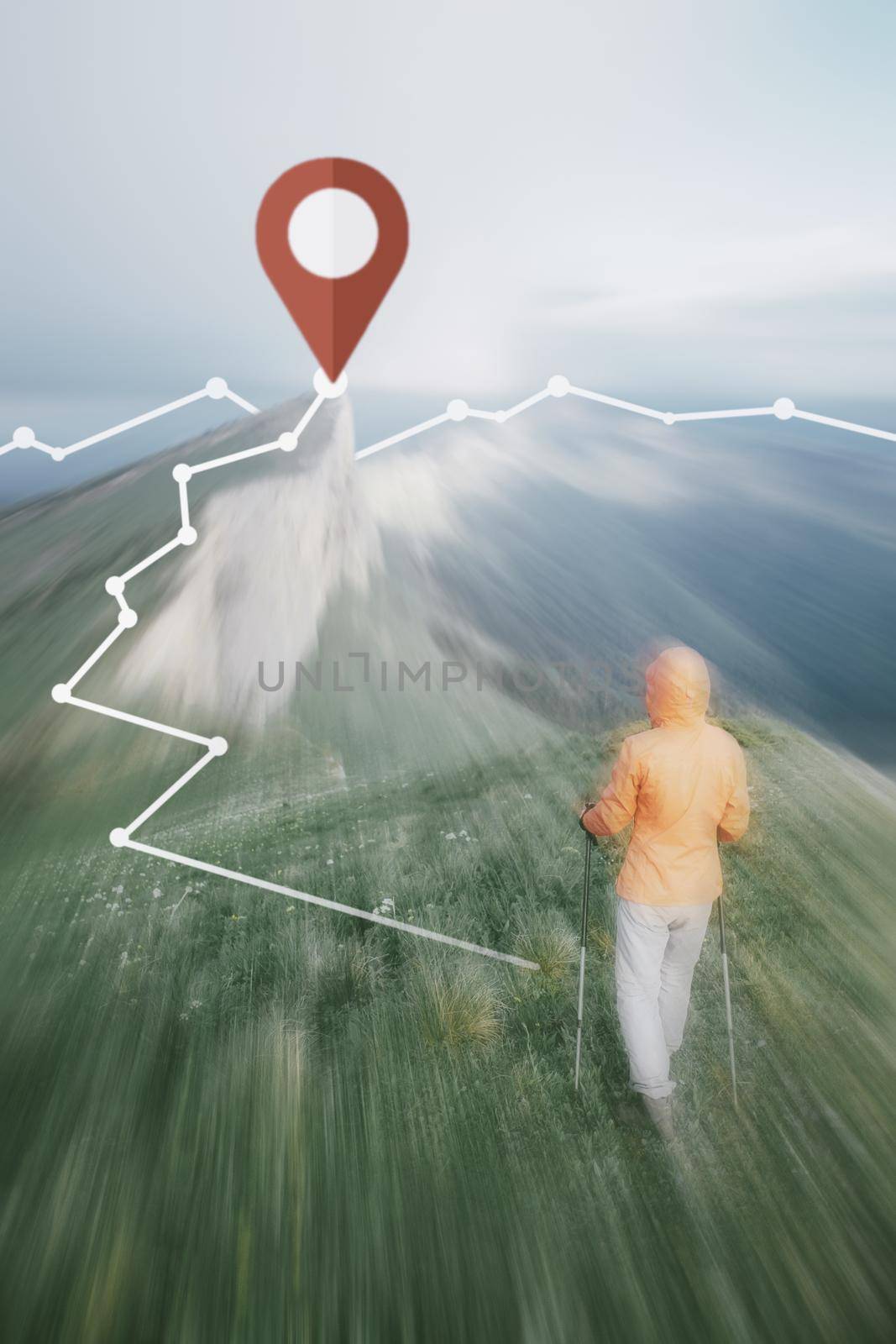 Hiker woman walking on mountain ridge with location GPS pin and track. Image with moving fast and motion blur effect.