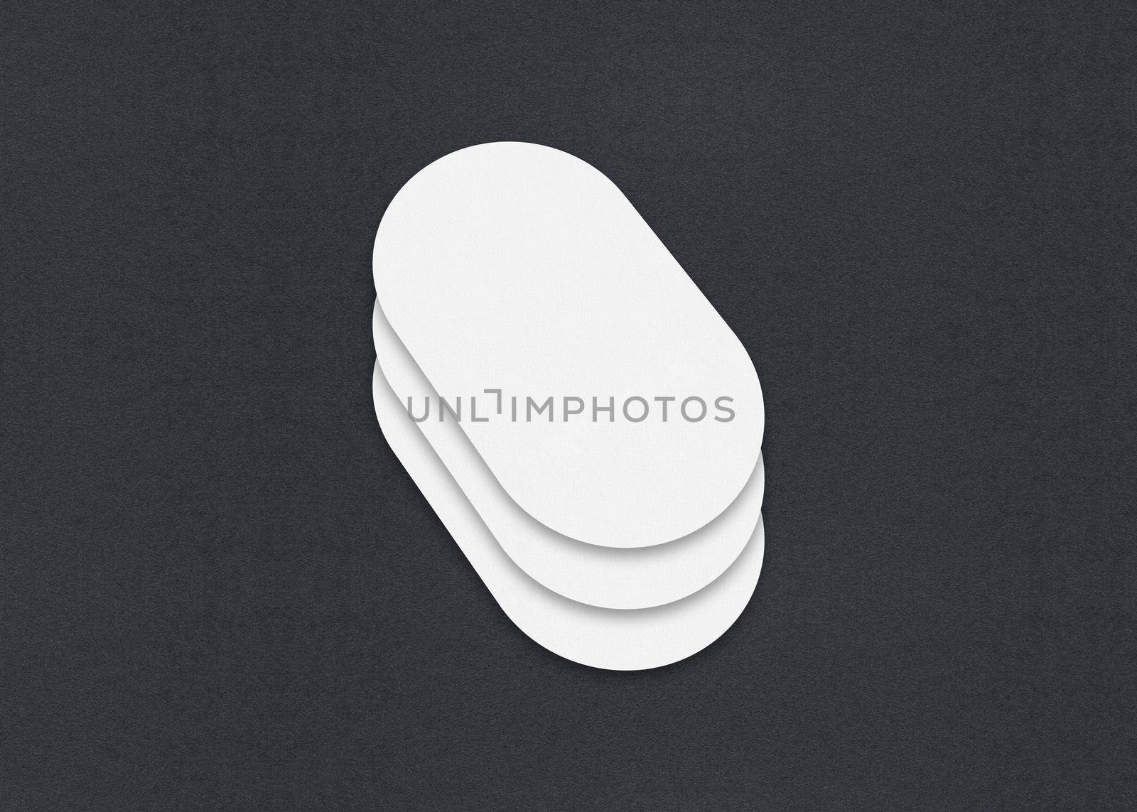 Blank white Business card mockup stacks at grey textured paper background.