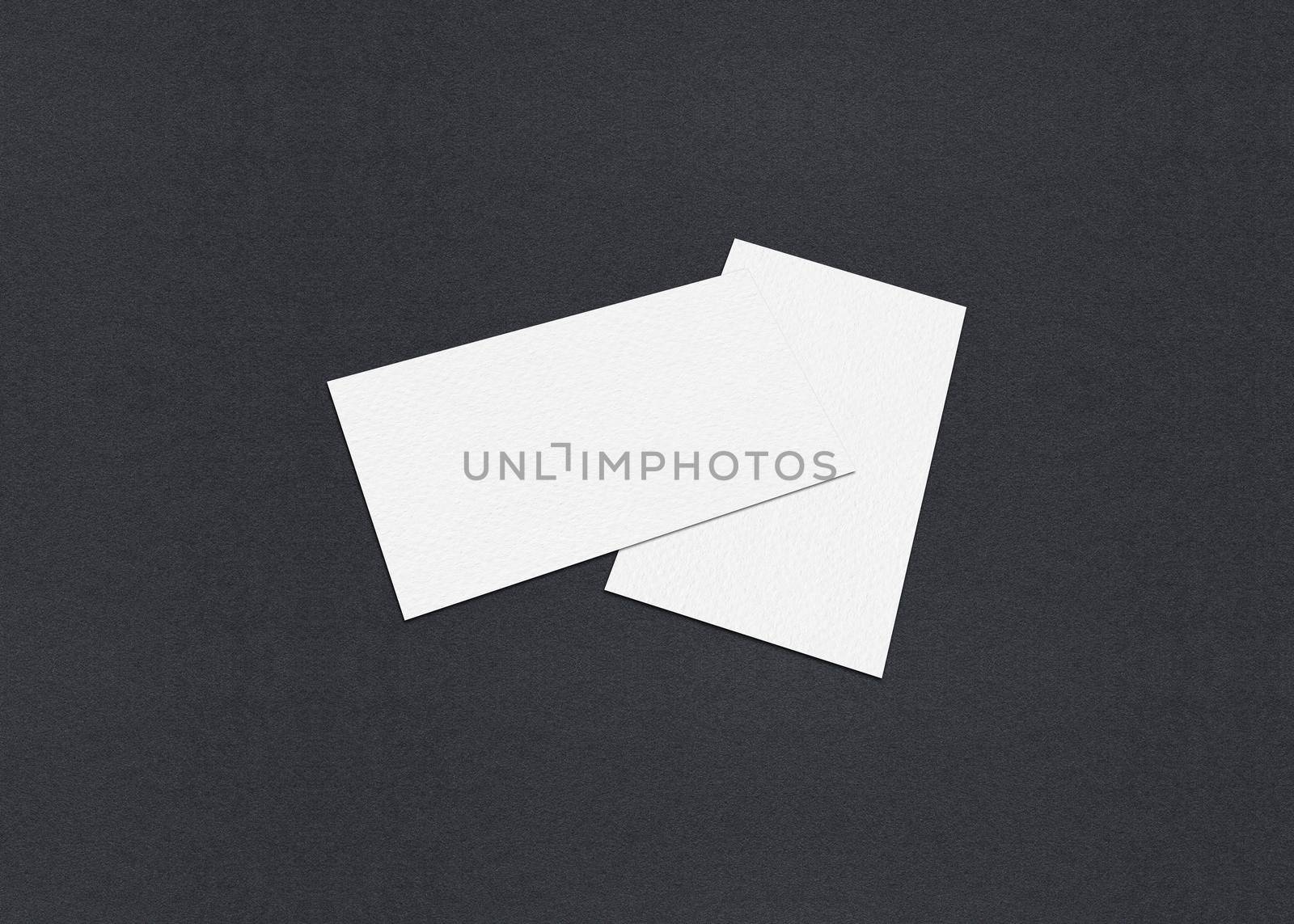 Blank white Business card mockup stacks at grey textured paper background.