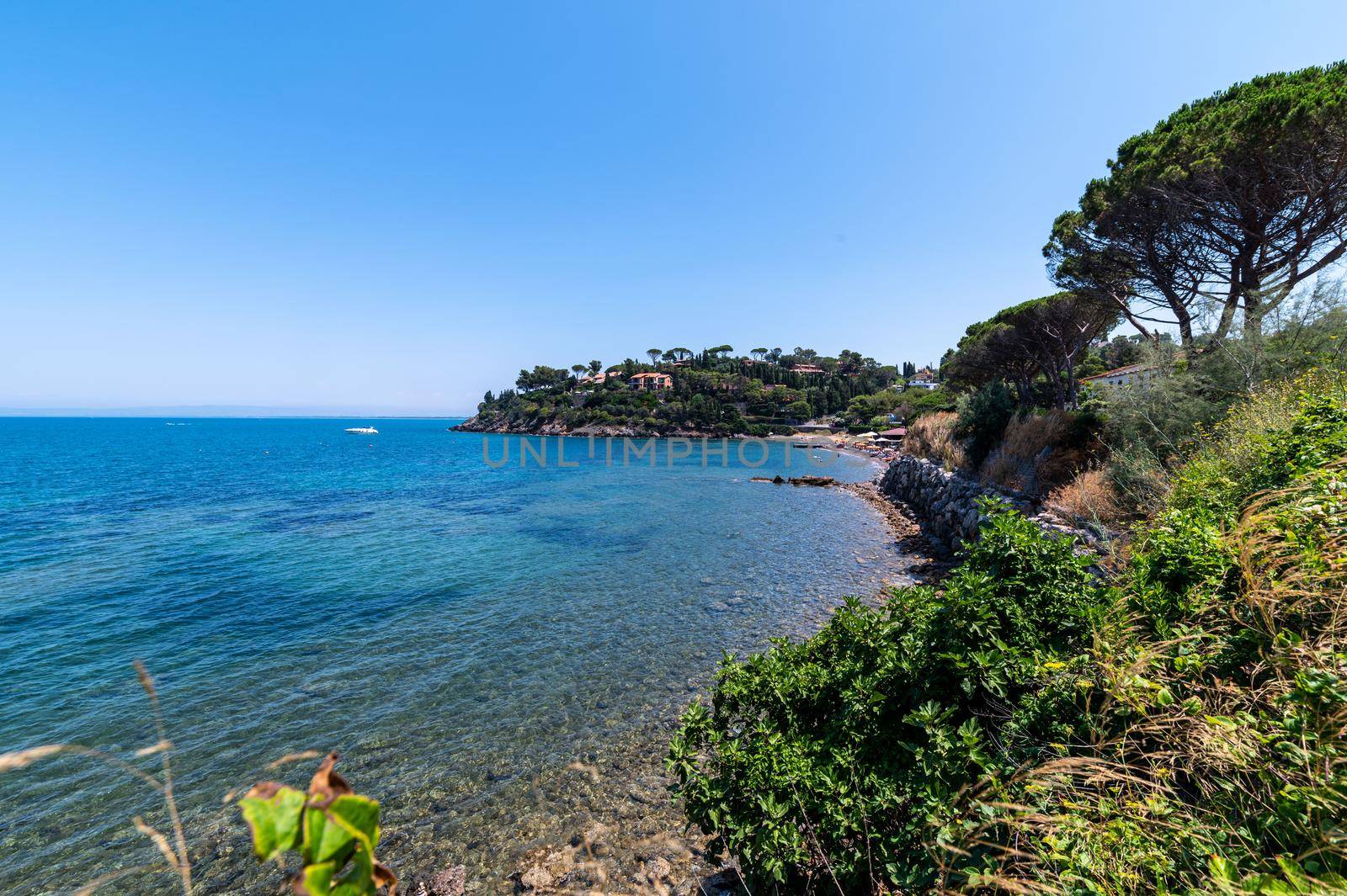 view of a cove in Porto Santo Stefano in the summer