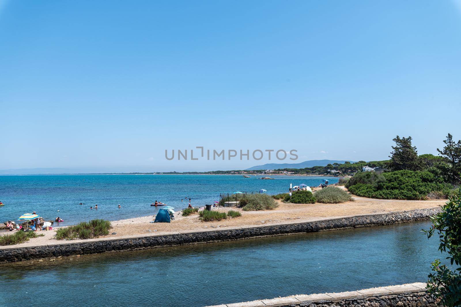 view of a cove in Porto Santo Stefano in the summer