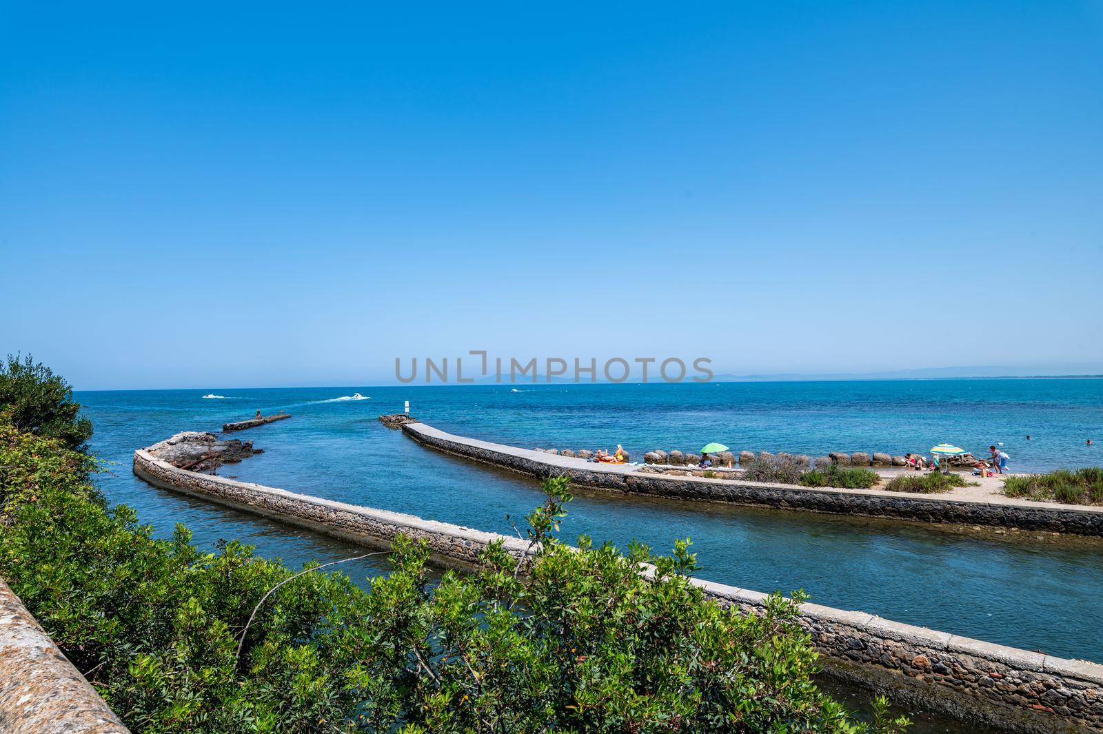 view of a cove in Porto Santo Stefano in the summer