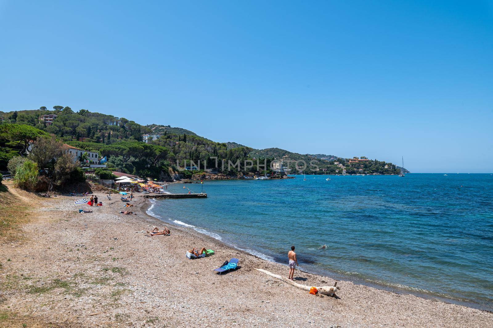 porto santo stefano,italy july 24 2021:beach landscape in Porto Santo Stefano