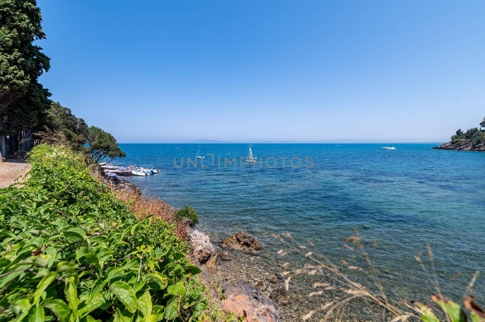 view of a cove in Porto Santo Stefano in the summer