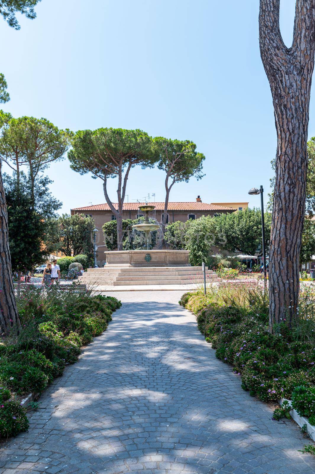 orbetello,italy july 24 2021:public gardens the fountain of orbetello