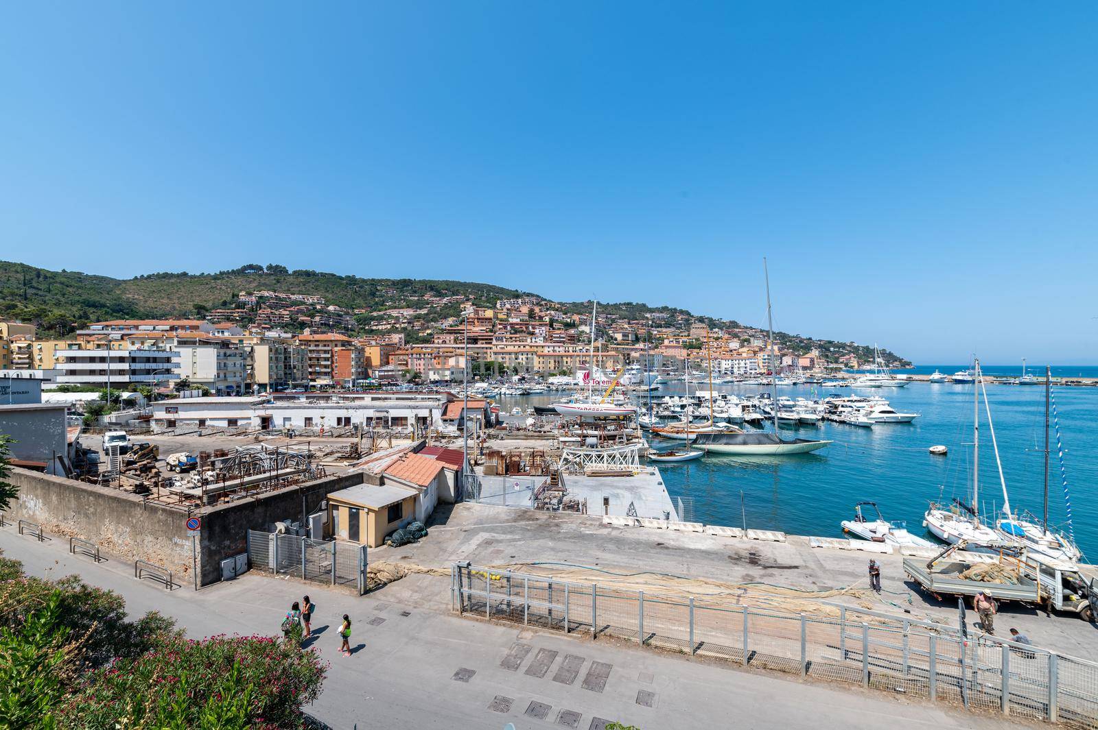 porto santo stefano,italy july 24 2021:Porto Santo Stefano landscape seen from the port