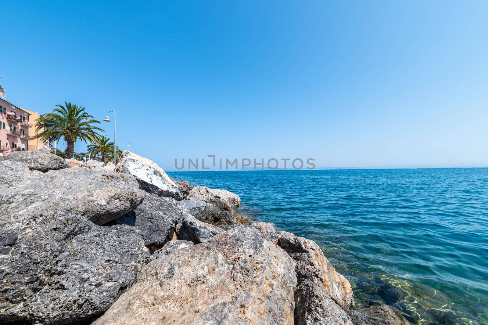 Porto Santo Stefano landscape the cliff and the sea in summer