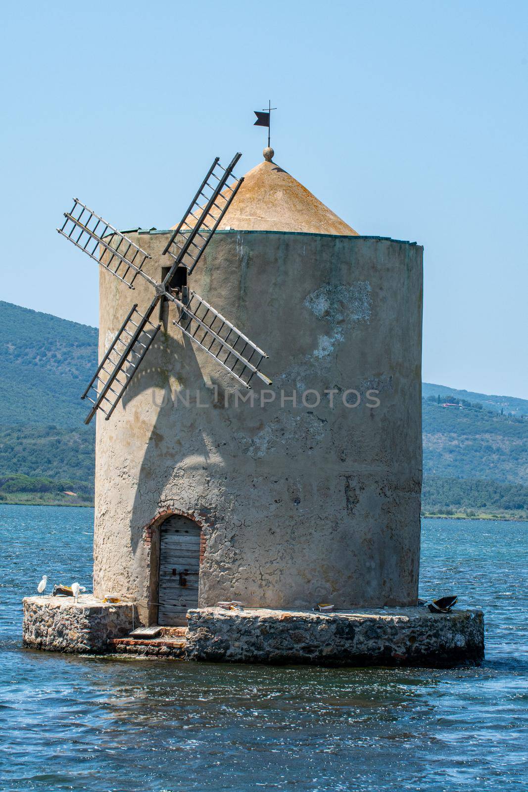 famous mill in the sea in Orbetello by carfedeph