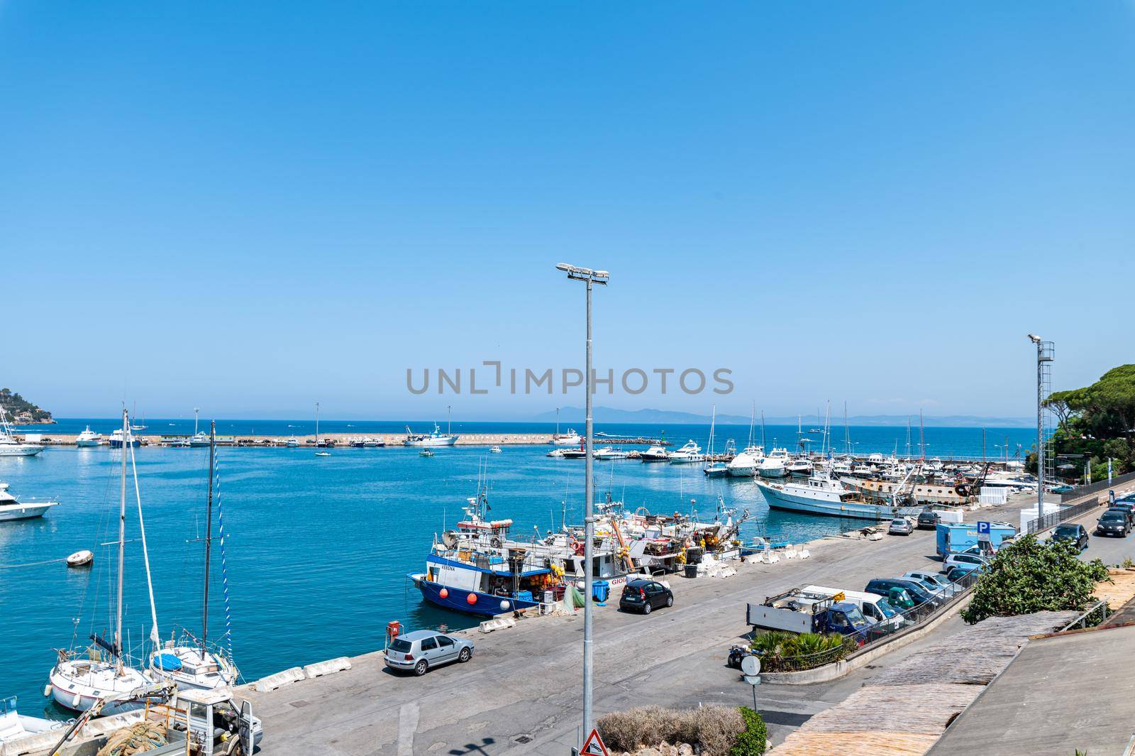 porto santo stefano,italy july 24 2021:Porto Santo Stefano landscape seen from the port