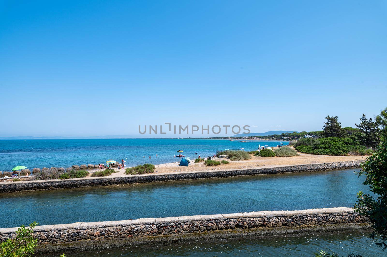 view of a cove in Porto Santo Stefano in the summer